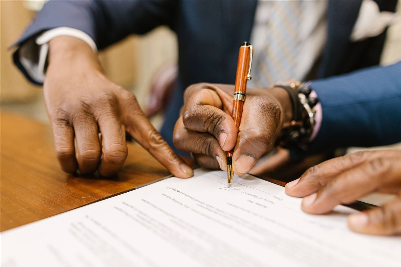 Lawyer signing case documents, IT support for litigation firms in Mississauga