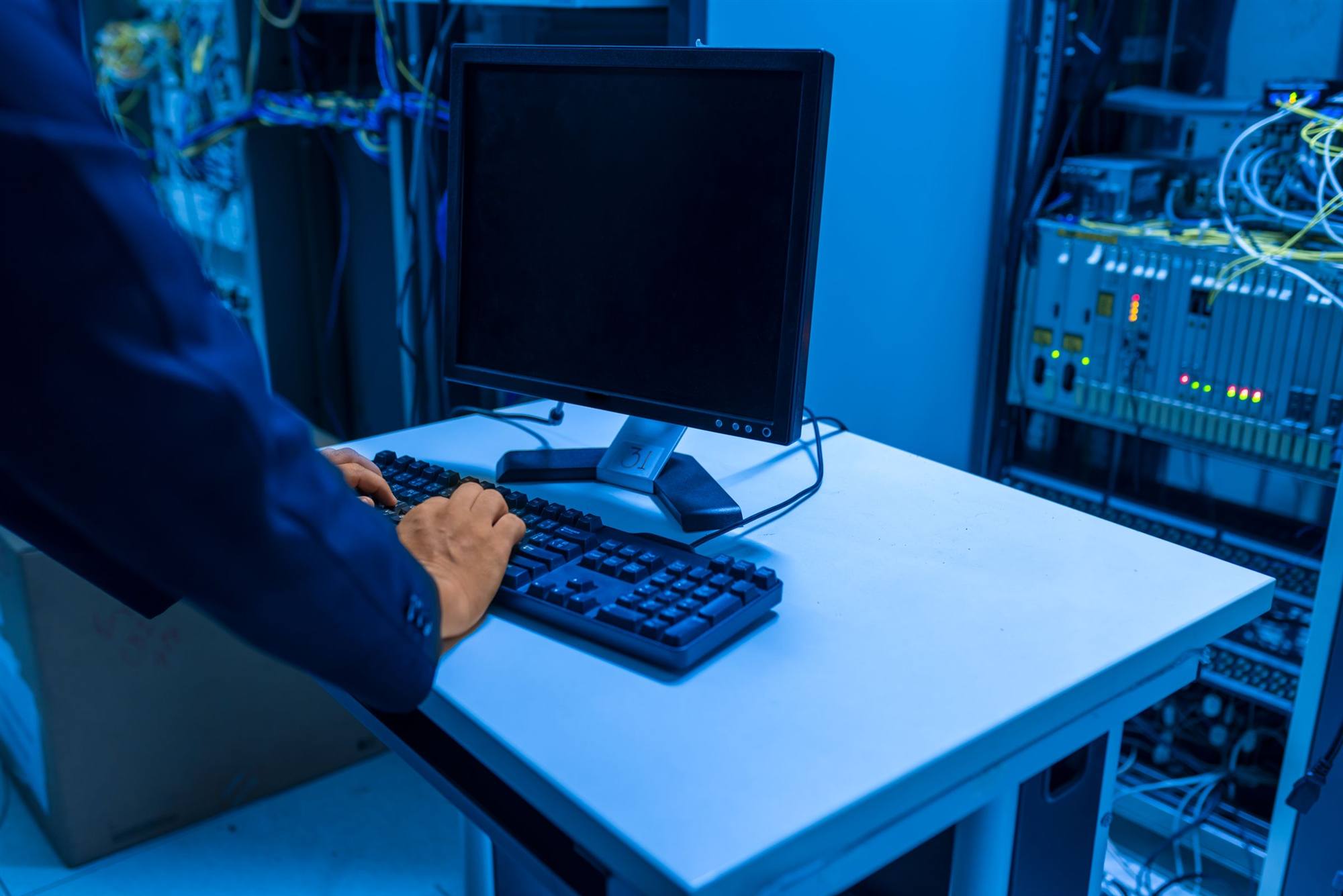 IT technician monitoring servers for a managed IT services client in Toronto