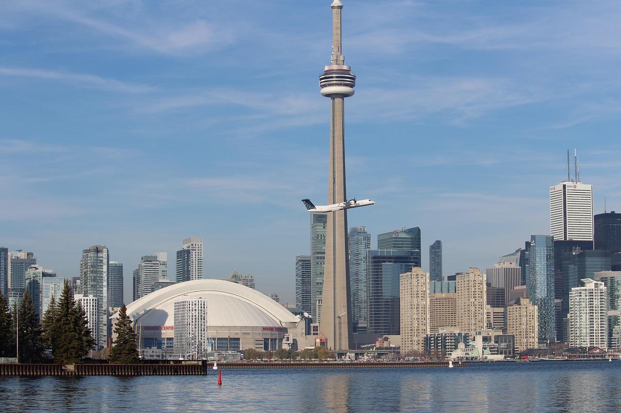 Toronto skyline in daytime with the CN Tower, Rogers Centre, and financial district towers